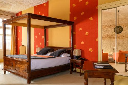 Кровать или кровати в номере Hotel Les Hautes Roches