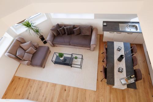SYMPHONY Apartments 40 - Modern Loft with Terrace and Grill in Central Location