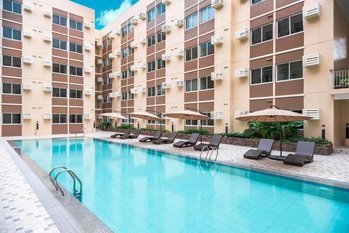 Πισίνα στο ή κοντά στο 2024 Condo Suites, Wi-Fi+Netflix