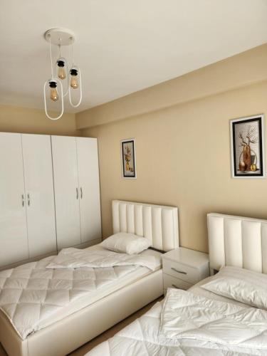 Voodi või voodid majutusasutuse Marvellous Apartment at EXALCO toas