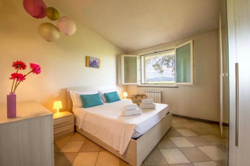 Postel nebo postele na pokoji v ubytování Casa Vacanze Vignarca - Località Perelli