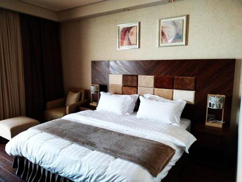 Katil atau katil-katil dalam bilik di Caesar Dreamland Apartment