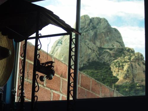 a window with a view of a mountain view at Hotel Mirador Real in Bernal