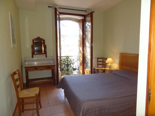 Tempat tidur dalam kamar di Les Santolines