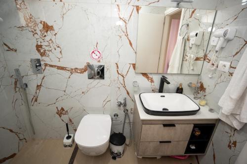 Kúpeľňa v ubytovaní Olivia Apartment