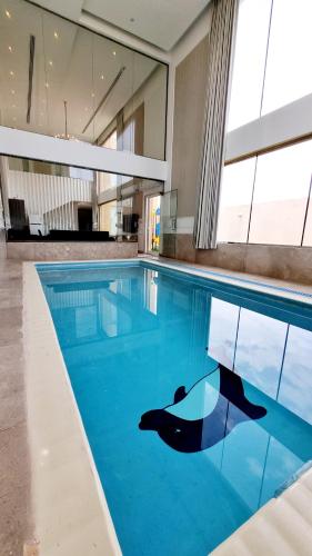 Baseinas apgyvendinimo įstaigoje Al-Mona Resort شاليه المنى الخبر arba netoliese