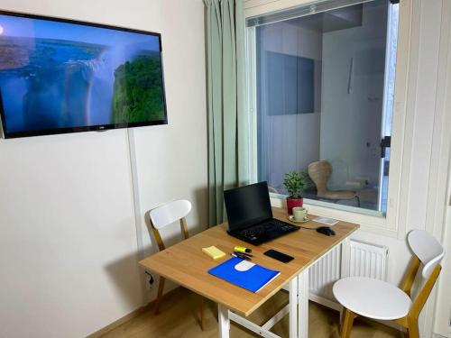 Televisyen dan/atau pusat hiburan di Docent's Flat