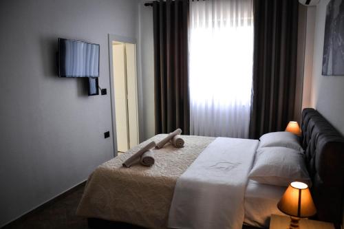 Cama o camas de una habitación en Horizont Apart-Hotel