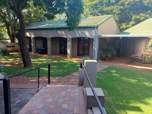 a house with a porch with a tent at 999 Pretorius street in Pretoria