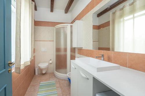 Vonios kambarys apgyvendinimo įstaigoje Villa Zanina
