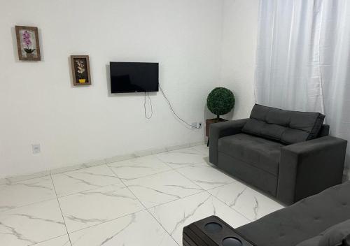 Μια τηλεόραση ή/και κέντρο ψυχαγωγίας στο 3 Prox Aeroporto Confins, Cid Galo, 15min Belo horizonte