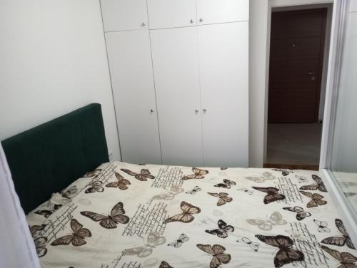 Ein Bett oder Betten in einem Zimmer der Unterkunft Apartman City BL