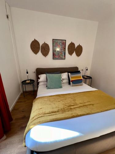 a bedroom with a bed with two pillows on it at Charming Navona in Rome