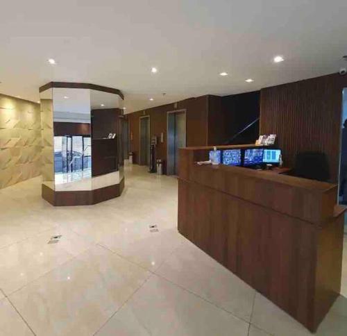 a lobby of a hotel with a reception desk at Loft Vista dos Arcos in Rio de Janeiro