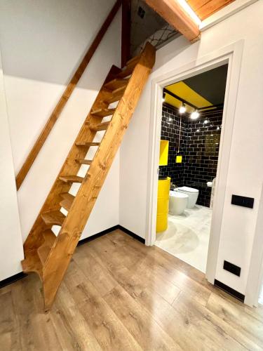Postel nebo postele na pokoji v ubytování Gray Suite con sauna