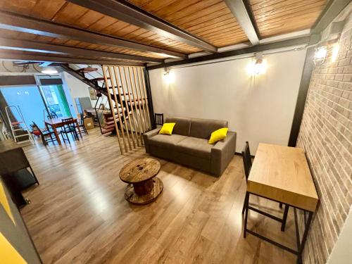 Posezení v ubytování Gray Suite con sauna