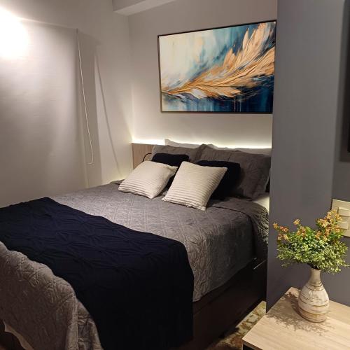 Postel nebo postele na pokoji v ubytování Metrô Studio Blem Belenzinho