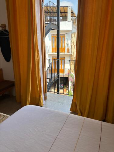 Postel nebo postele na pokoji v ubytování Santa Cecilia Hotel