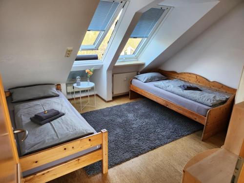 Giường trong phòng chung tại Helles, ruhiges, neues Quartier, Herkules Blick