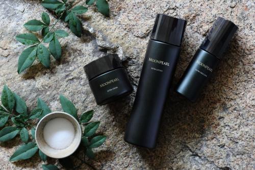a group of three bottles of sunscreen and a cup of coffee at HOTEL THE MITSUI KYOTO, a Luxury Collection Hotel & Spa in Kyoto