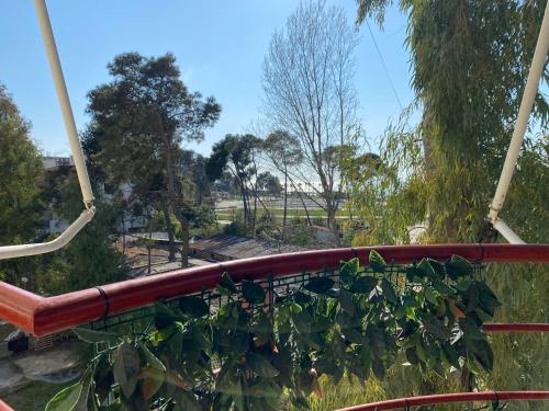 a view of a park from a roller coaster at Delight Apartments in Golem