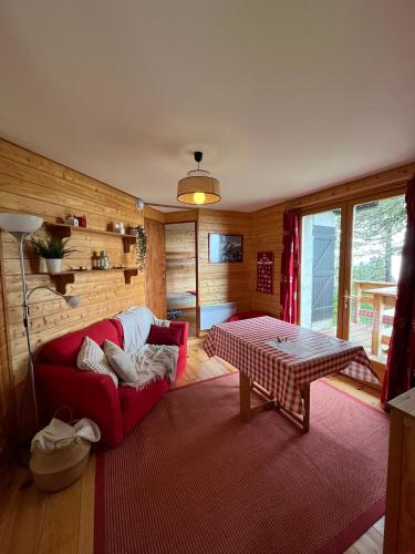 Postel nebo postele na pokoji v ubytování Chalet des Myrtilles - chalet cosy avec vue