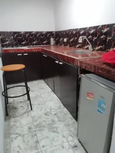 Η κουζίνα ή μικρή κουζίνα στο apartamento aura