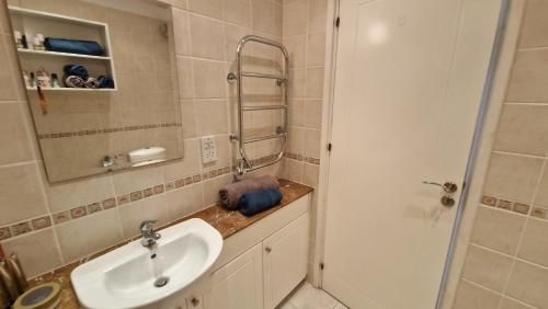 Ванная комната в Romanson Seaview Apartment