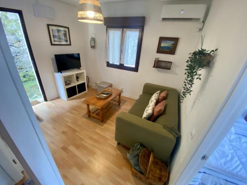 TV a/nebo společenská místnost v ubytování Apartamento en casco histórico de Lastres
