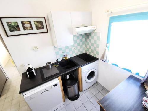 Köök või kööginurk majutusasutuses Résidence ILE DES PECHEURS - Maisons & Villas pour 6 Personnes 54