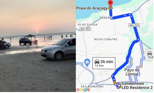a map and a car parked on a beach at Apto bem localizado est de Ribamar ao lado do shopping in São-José-do-Ribamar