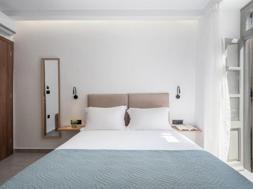 Postel nebo postele na pokoji v ubytování Porto Vecchio