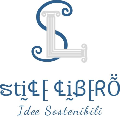 都靈的住宿－Stile Libero Guest House，冰海鲜餐厅的标志,写着字母I