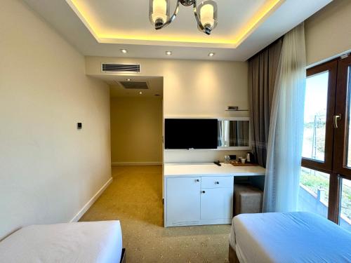 Letto o letti in una camera di Green Roof Boutique Hotel & SPA Istanbul Airport