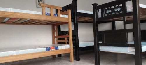 a group of bunk beds in a room at LA MEDELLIN HOSTAL in Cartagena de Indias