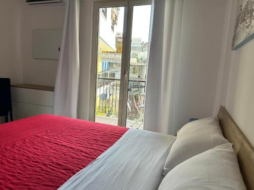 Postel nebo postele na pokoji v ubytování LUNA e AMBRA case vacanze