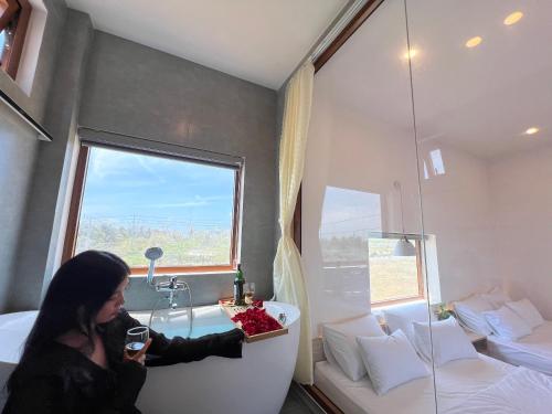 Postel nebo postele na pokoji v ubytování VILLA MINH HẬU