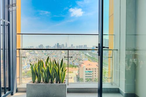 a view of a city from a window in a building at Son&Henry Zenity District 1 in Ho Chi Minh City