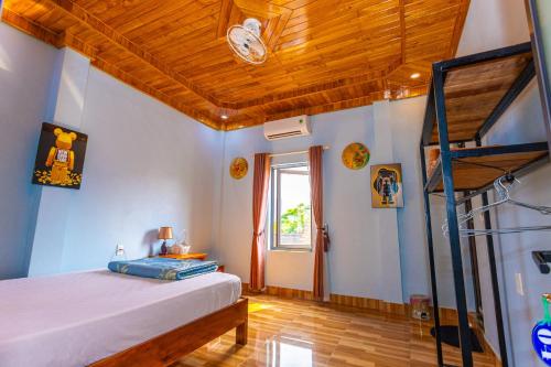 Ένα ή περισσότερα κρεβάτια σε δωμάτιο στο Son River Homestay