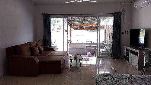 Μια τηλεόραση ή/και κέντρο ψυχαγωγίας στο Koh Tao Townhouse