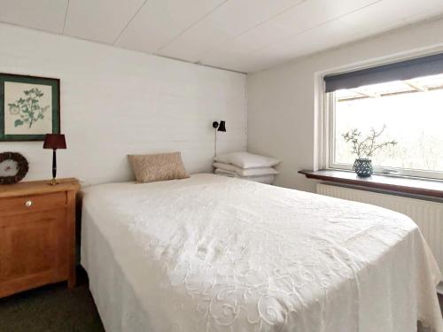 Ένα ή περισσότερα κρεβάτια σε δωμάτιο στο Holiday home Skjern XXI