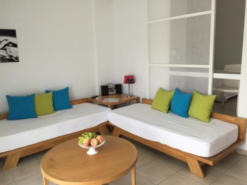 Ein Bett oder Betten in einem Zimmer der Unterkunft Possidi Hiliadou Boutique Resort