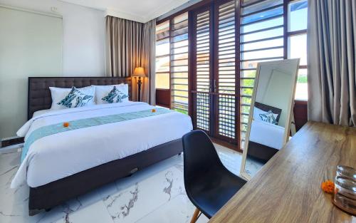Postel nebo postele na pokoji v ubytování Villa Rumpi Seminyak by Nagisa Bali