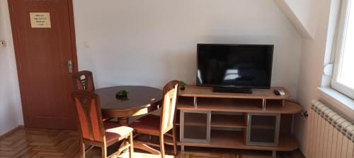 TV/trung tâm giải trí tại Guest House Sani