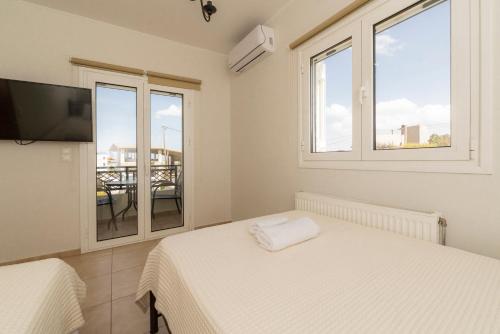 Ένα ή περισσότερα κρεβάτια σε δωμάτιο στο Creta Luxury Villas