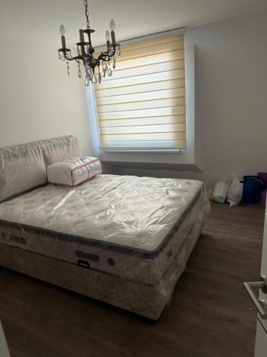 Ένα ή περισσότερα κρεβάτια σε δωμάτιο στο Vila Garanga