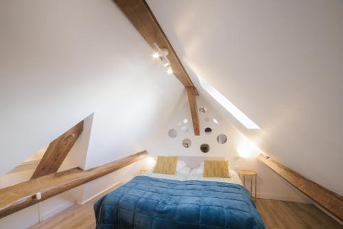 Krevet ili kreveti u jedinici u okviru objekta Domaine de l’Orangerie - La Suite Clémentine