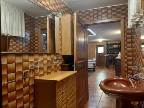 a bathroom with a sink and a toilet at Yes we camp! Cevedale in Ossana