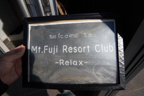 07 Resort Club -Relax-に飾ってある許可証、賞状、看板またはその他の書類