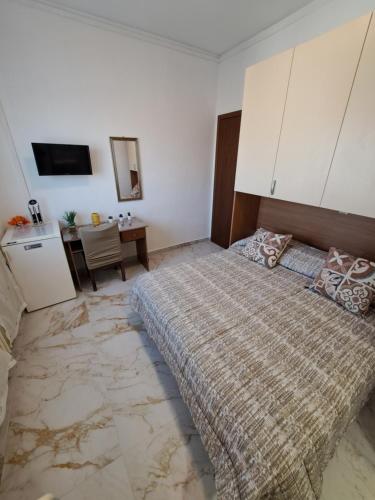 Una cama o camas en una habitación de Le Terrazze